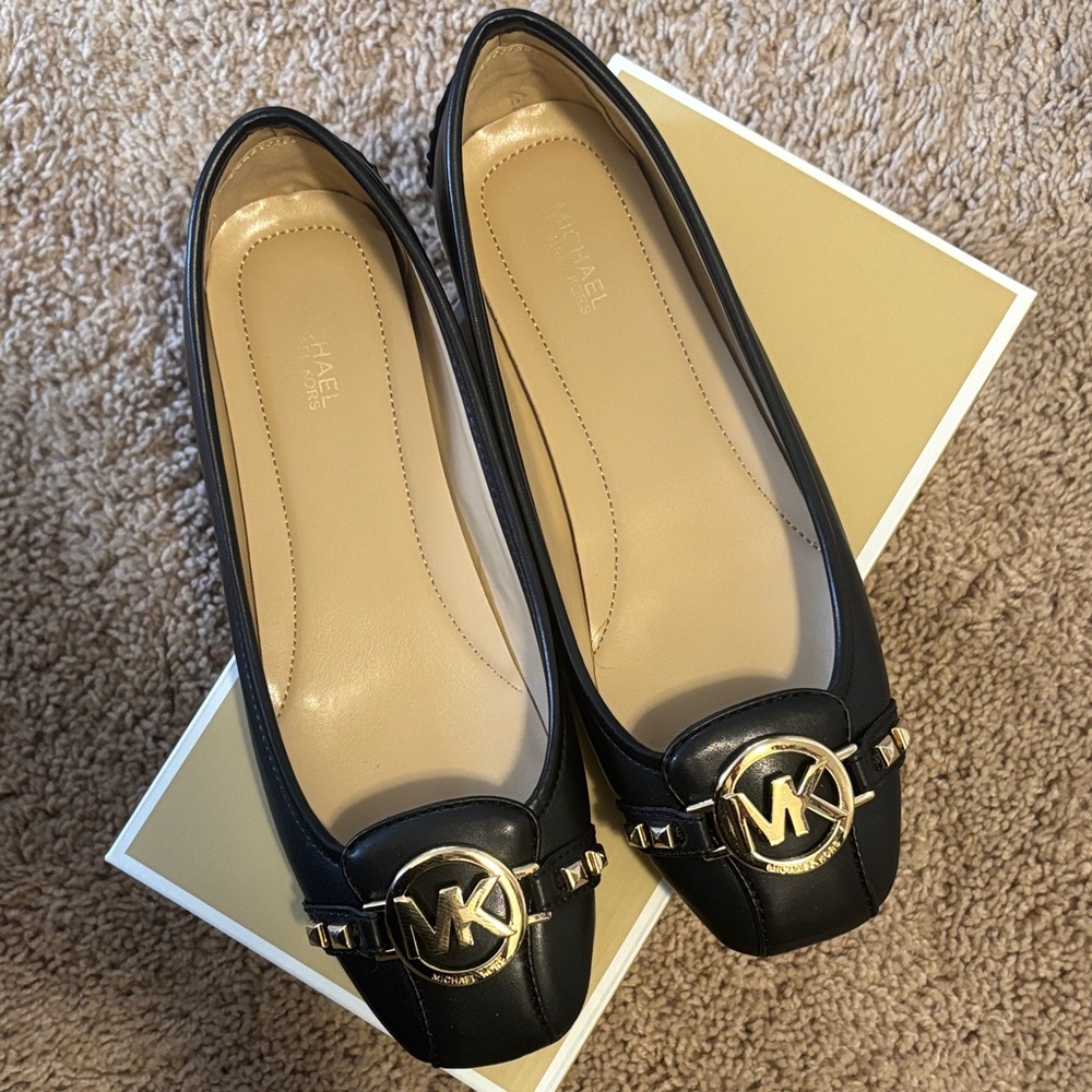 MICHAEL Michael Kors Black Leather Logo Ballet Flats with Gold Hardware